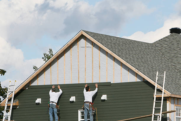Professional Siding Replacement technician working in New Springfield, OH